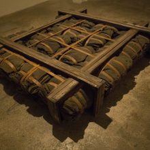 Majid Biglari, “February 15, 1945”, from “The Experience of Dishevelment” series, mixed media (steel strap, mask satchel, wool, etc.), 113 x 113 x 20 cm, unique edition, 2017
